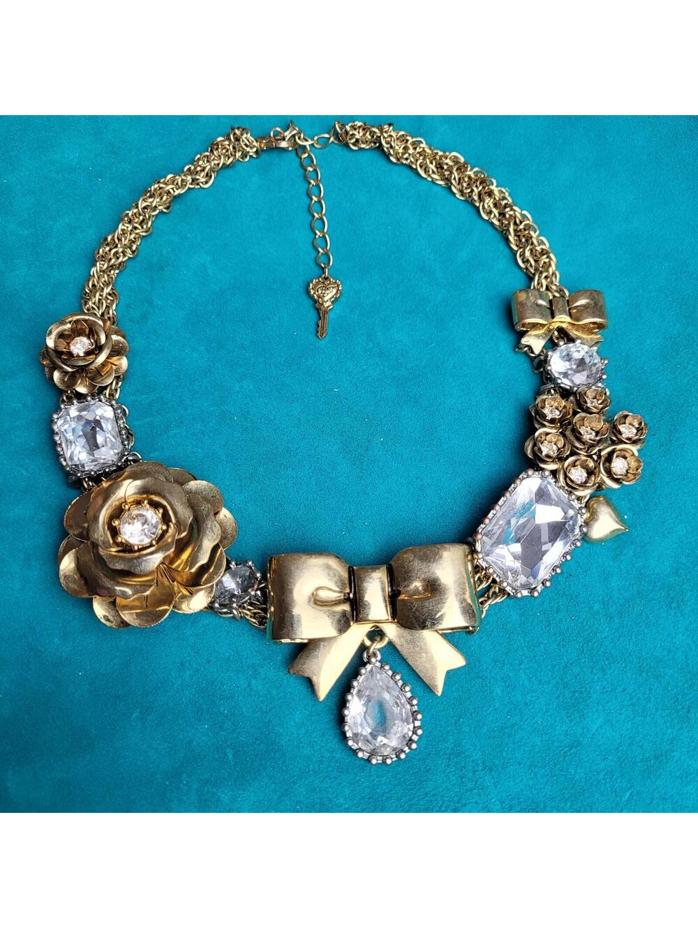 Betsey Johnson Gold Tone Bow Floral Statement Necklace with Clear Rhinestones
